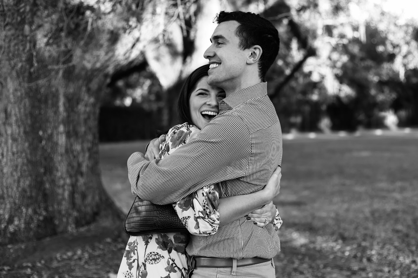 Alt text: Maggie and her late husband Brandon smiling together in a black and white photo